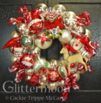 Red and white dominate to create a peppermint colored wreath of sweetest proportions. 17" diameter. $225 ** SOLD **