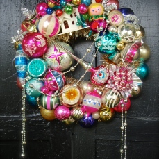 PINK PIXIE Pinks and other delights make for a bright wreath. Featuring lots of fabulous ornaments for your Christmas pleasure. 17" $265 *SOLD*