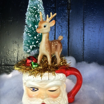Large Santa mug with a reindeer and a tree on top $36